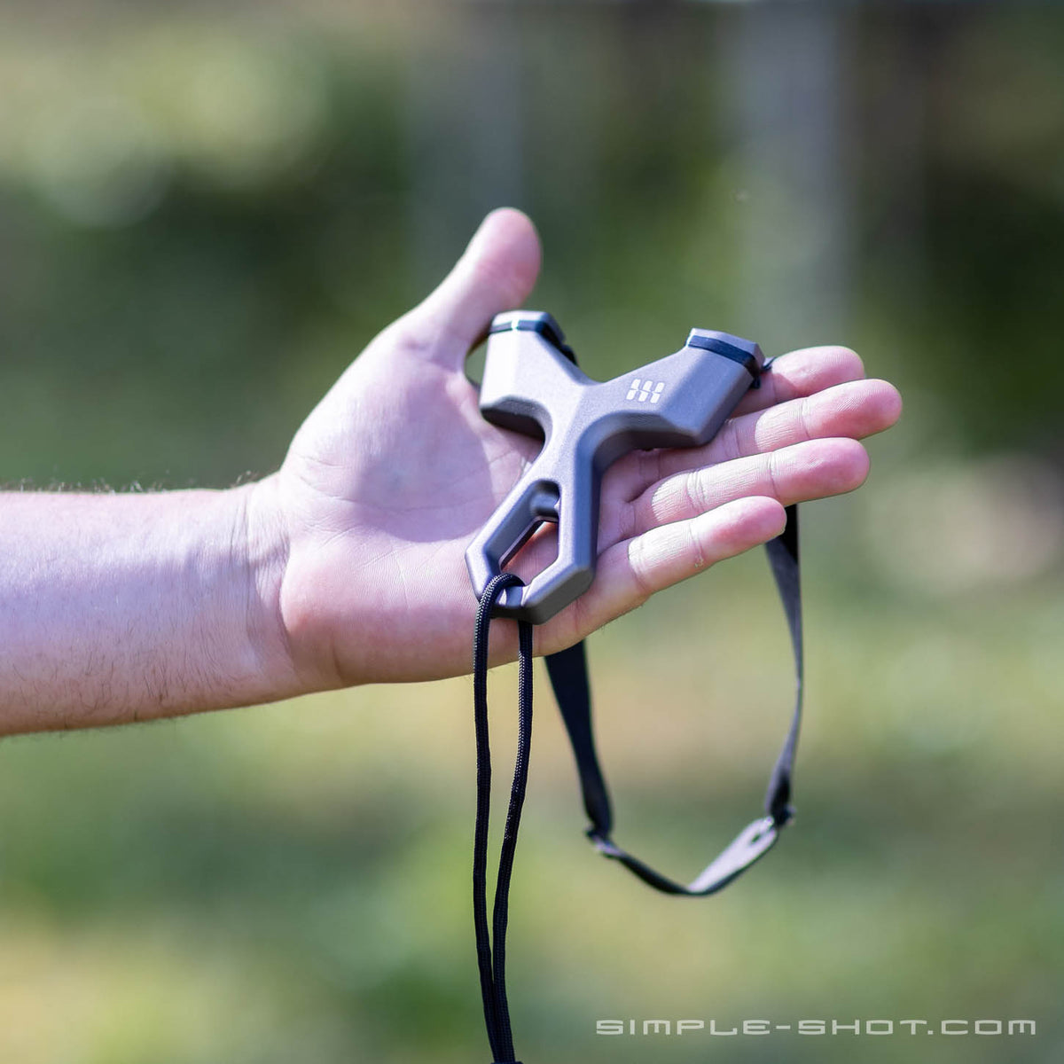 Slant Roller PRO resting in an open palm outdoors