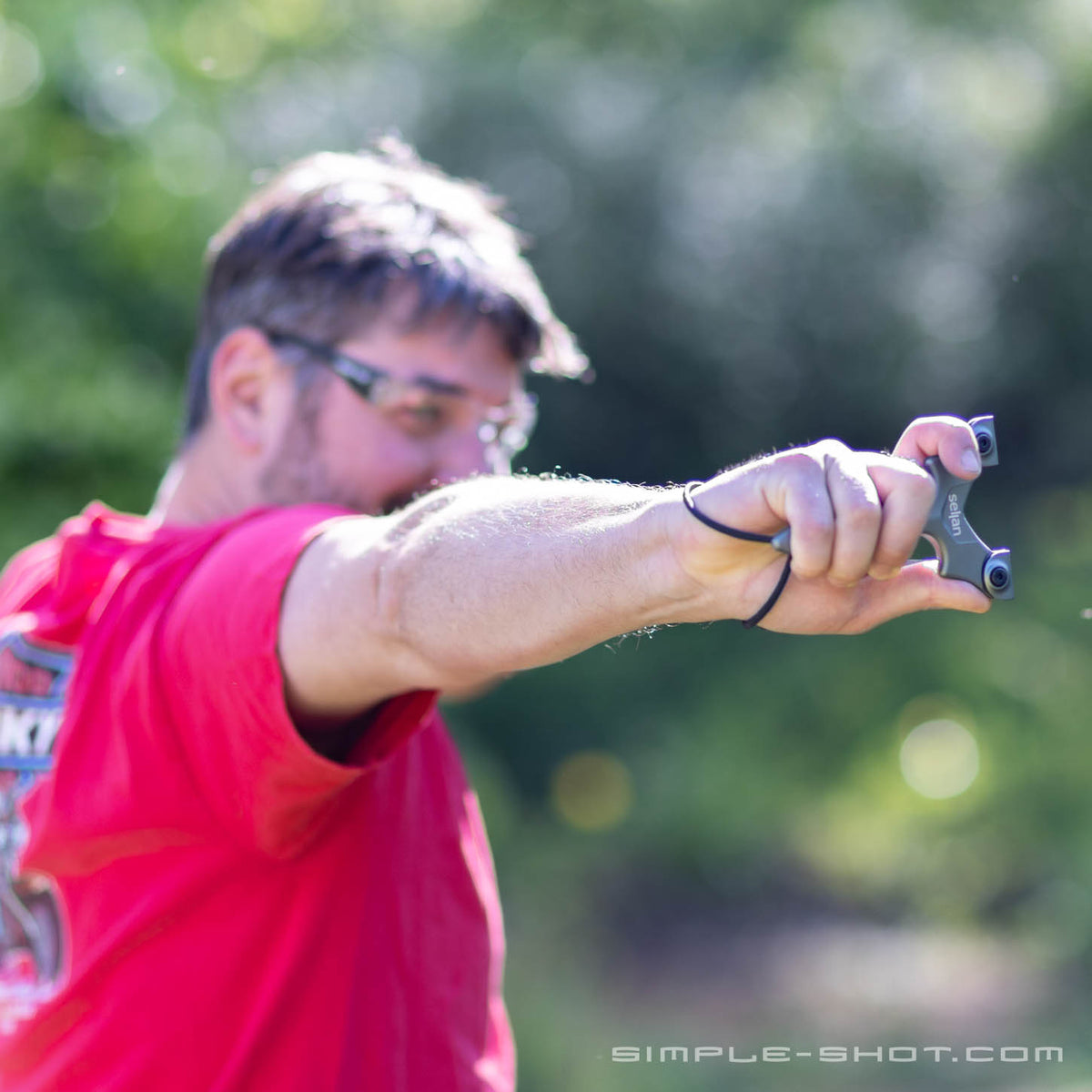 Shooter at full draw with the Stylus Keeper PRO outdoors