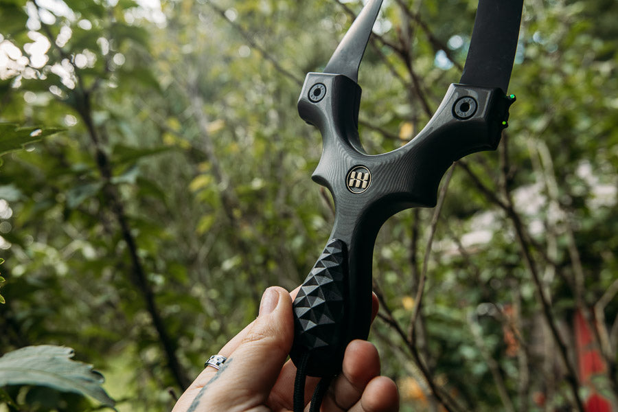Scout LT2 PRO Carbon Fiber slingshot held in hand