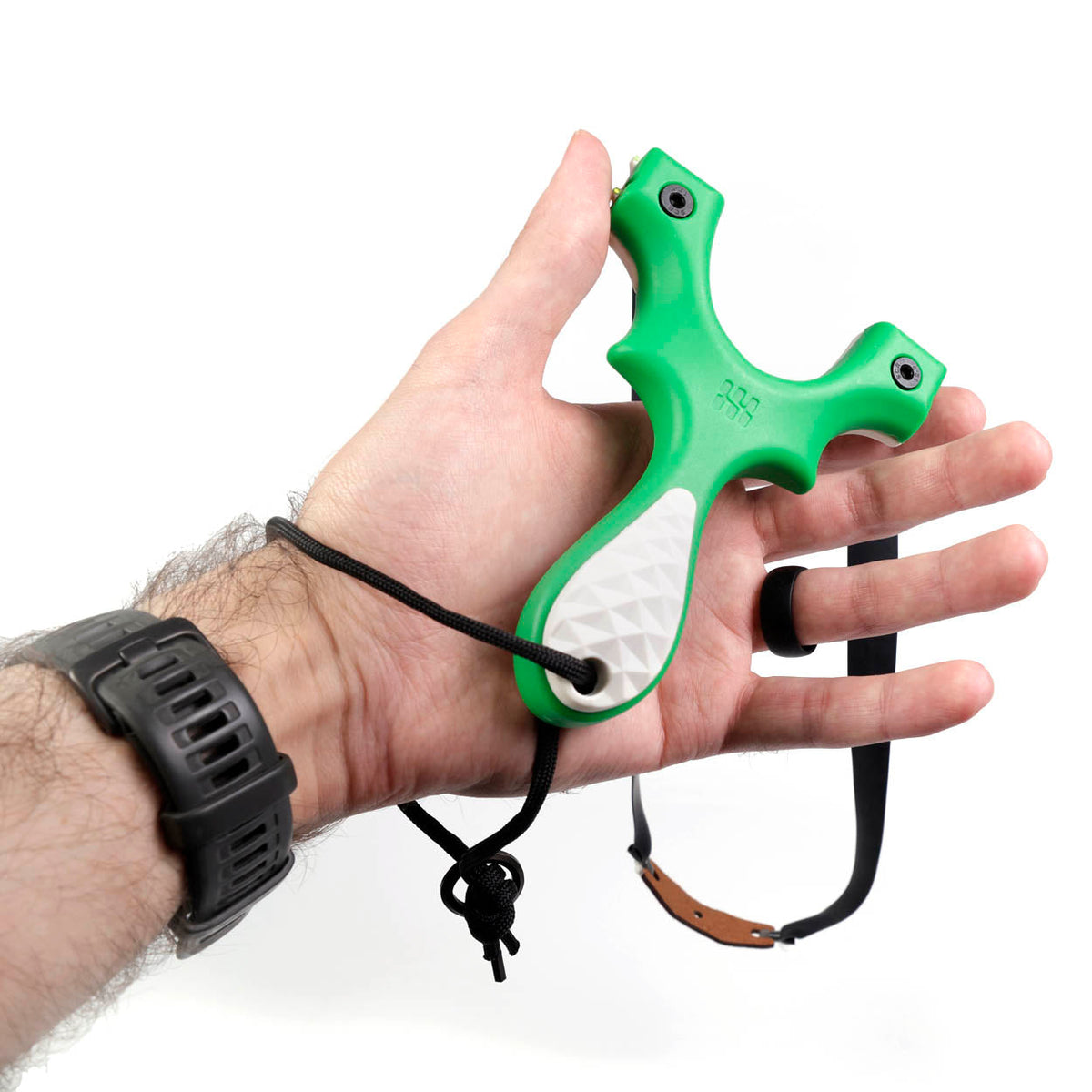 Scout LT2 4-H Edition slingshot in bright green with white scales and clips, held in hand with lanyard