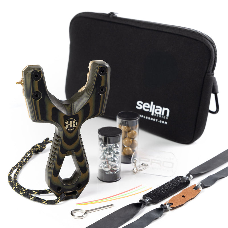 Slant Spartan slingshot in machined G10 and brass, designed by Mark Seljan