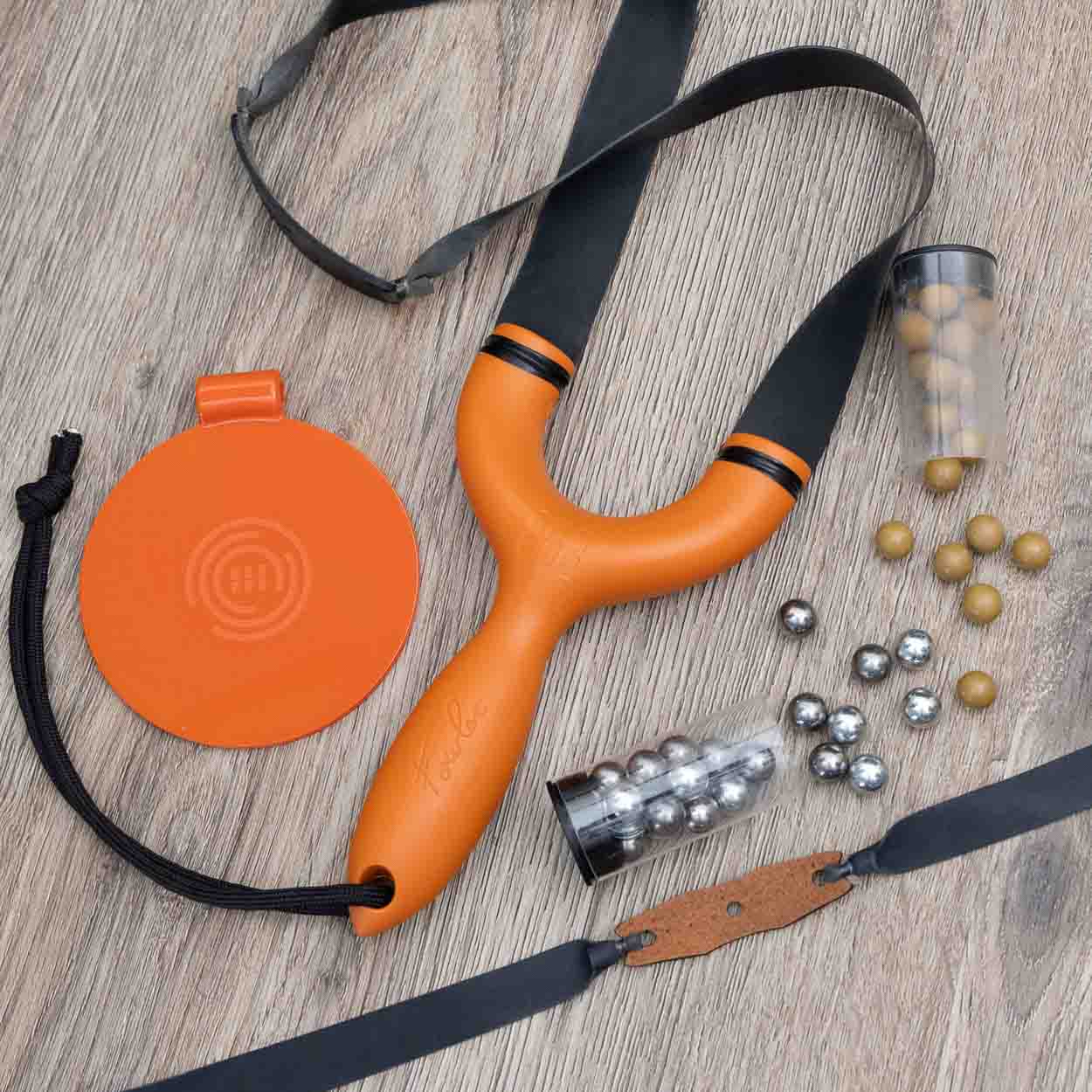 SimpleShot Sparrow slingshot with wrap-and-tuck bands, flat lay