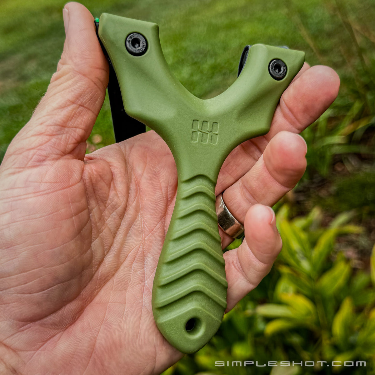 Axiom slingshot held in hand