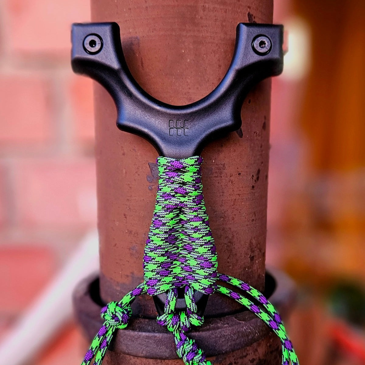 550 paracord in toxic green wrapped on a Scout X handle