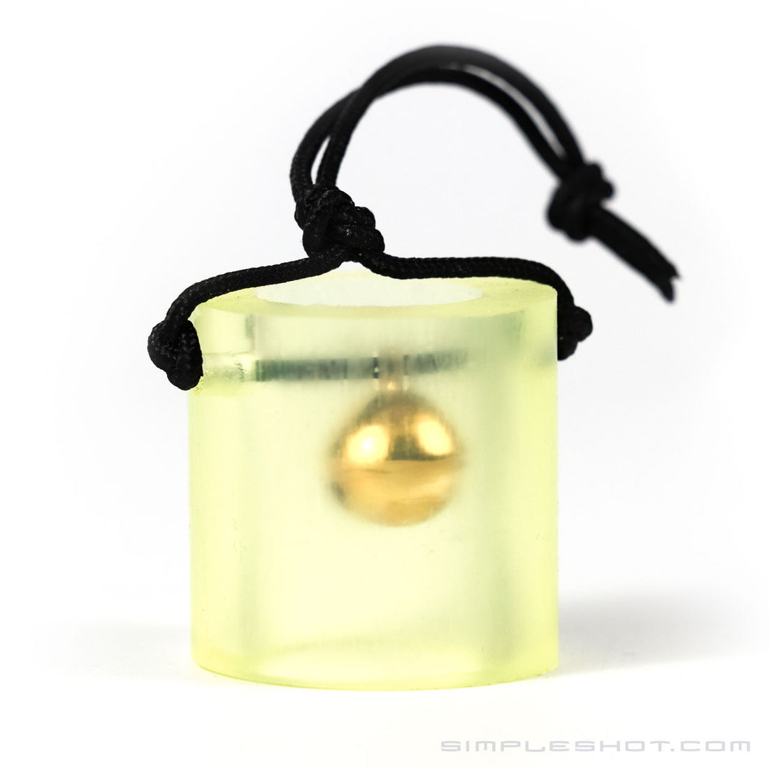 Bell Target, brass bell inside a clear yellow tube on a black cord