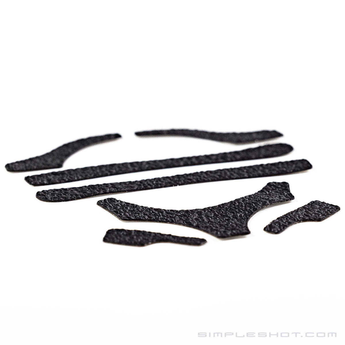 Custom-Cut Slingshot Grips in black, full set of cut pieces laid flat