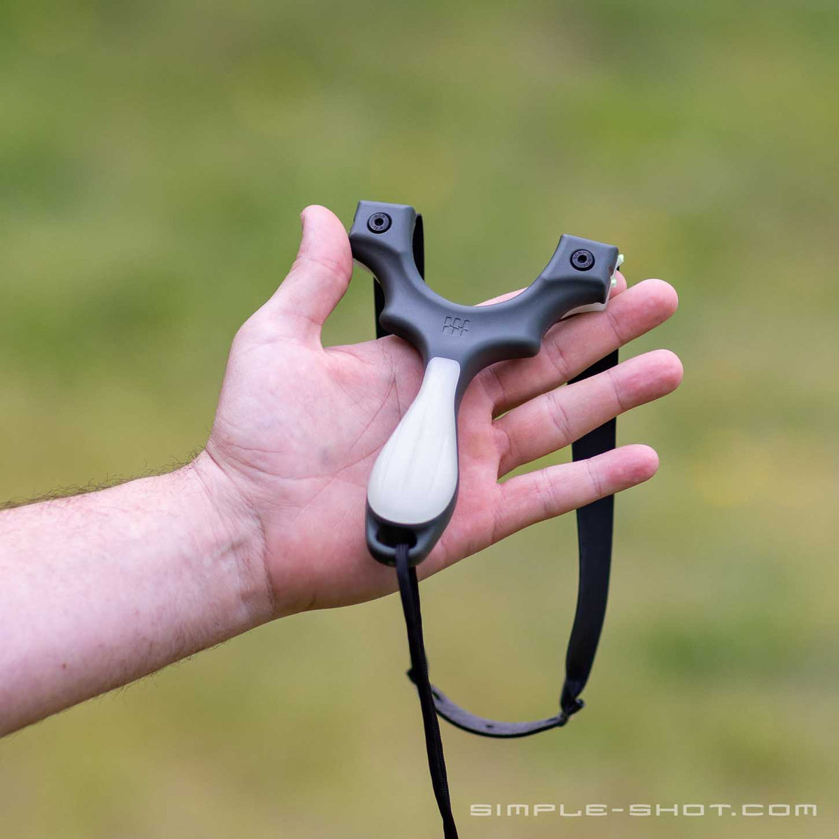 Scout X slingshot held in hand