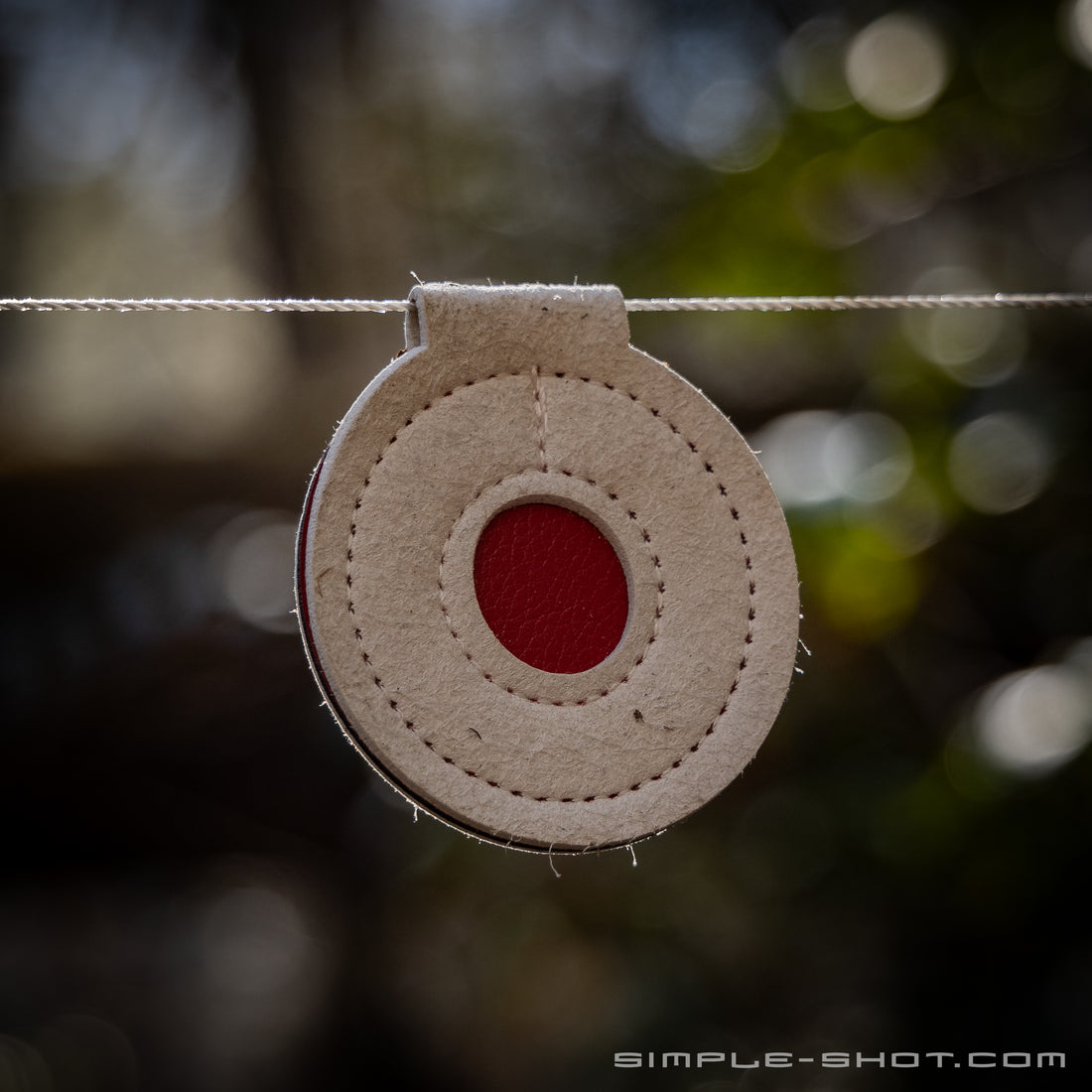 Microfiber Spinner Targets, white targets with red centers fanned out