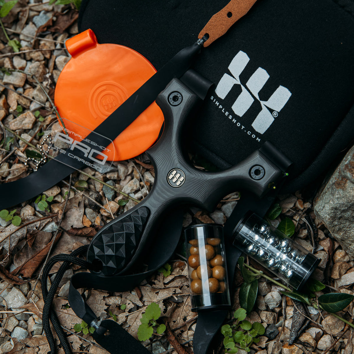 Scout LT2 PRO Carbon Fiber kit outdoors with carry case, orange target and ammo tubes