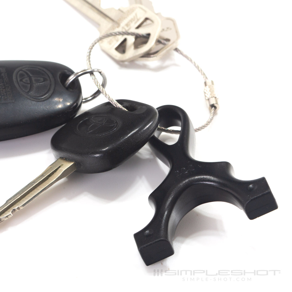 The Scout Keychain in black on a ring with car keys